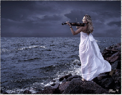 Cinemagraph animation of woman in a long white dress  playing violin to the open sea