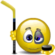 Animated smiley face emoticon hockey player with stick and puck smiles to show missing teeth