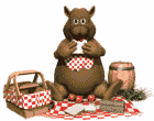 Bear having picnic lunch