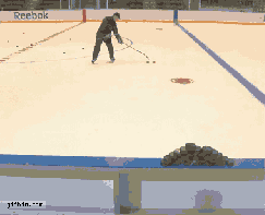 Crosby showing off his shooting skills nailing a pile of pucks on the rail then catching the one that tried to escape with a second shot