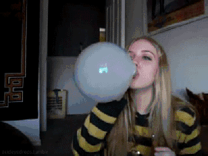 Moving picture of Girl blowing a smoke bubble