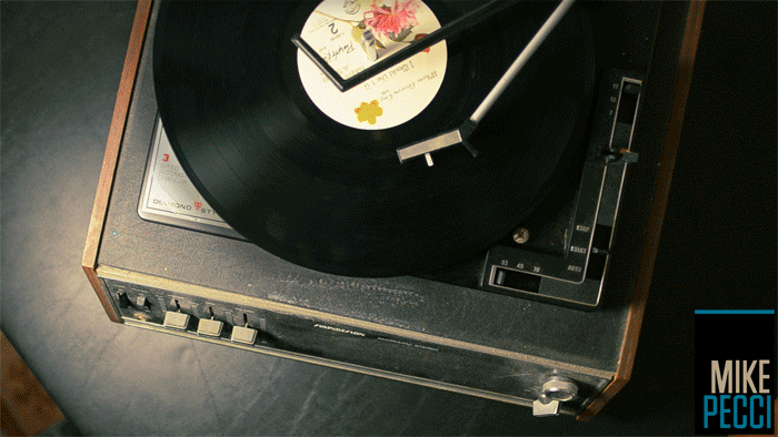 Old school record player at the end of a 33 RPM record album clicking away 