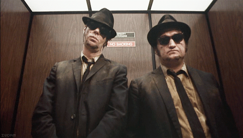 Two detectives in an elevator