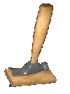Claw hammer pulling nail out of piece of wood