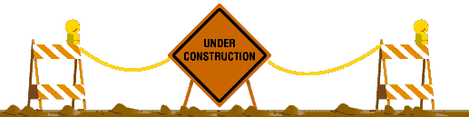 Under construction caution barricades with flashing lights and warning sign