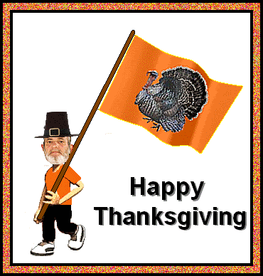 Animated Happy Thanksgiving banner showing a man in an orange shirt and black pants walking along with a Turkey picture on an orange flag 