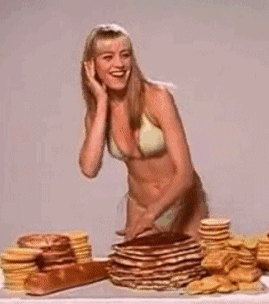Pamela polishing pancakes, Animated gif of her acting like a disc jockey doing a chicken scratch on a record