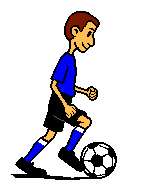 Boy in blue running along kicking a soccer ball along in front of him as he runs down the soccer field