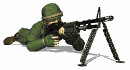 Soldier shooting a machine gun