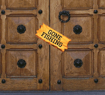 Gone fishing sign hanging on a door at the Parliament Building in Ottawa Canada